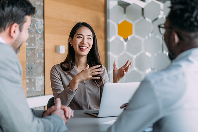 business woman talking to clients